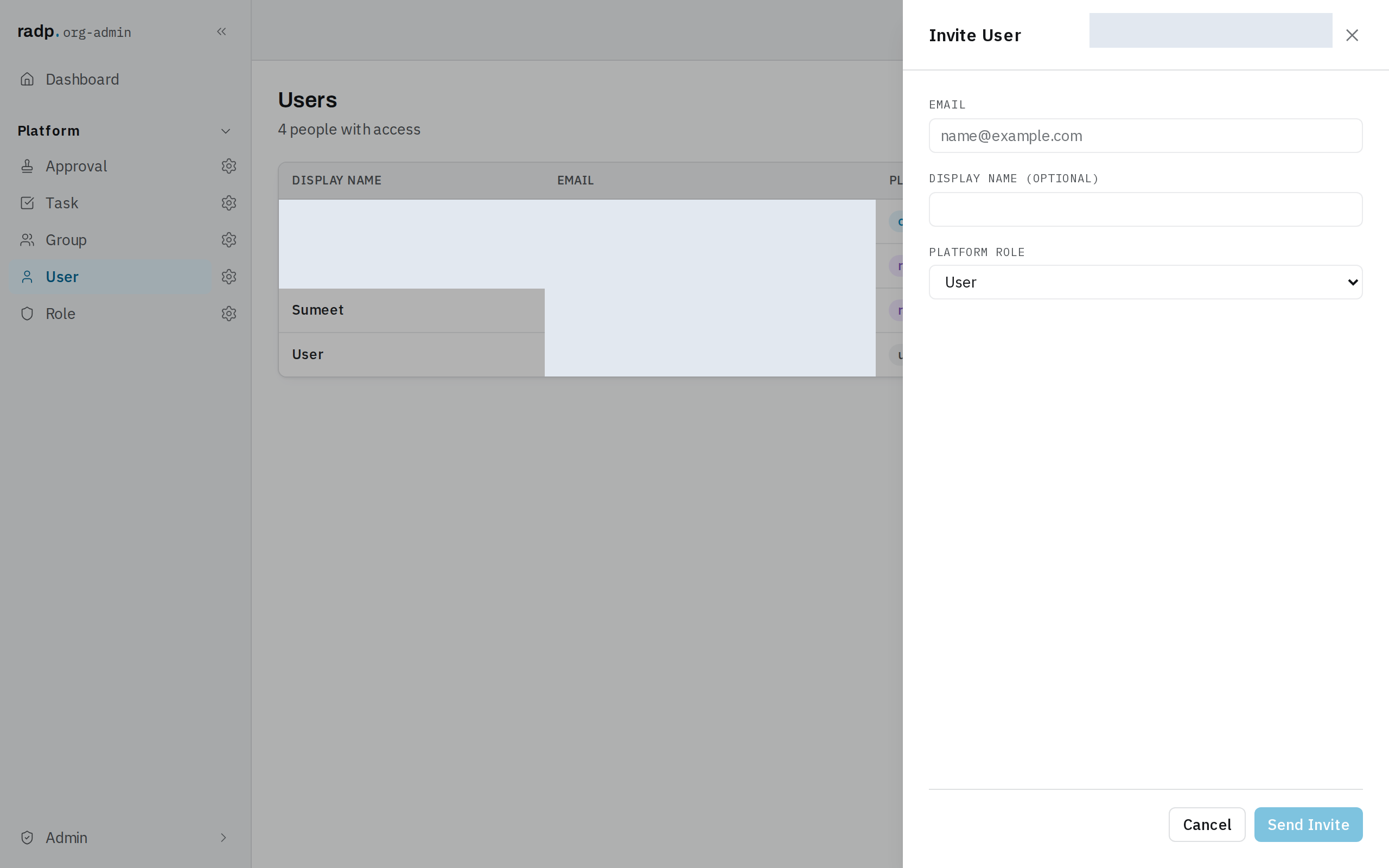 The Invite User form, with email, optional display name and a platform role list