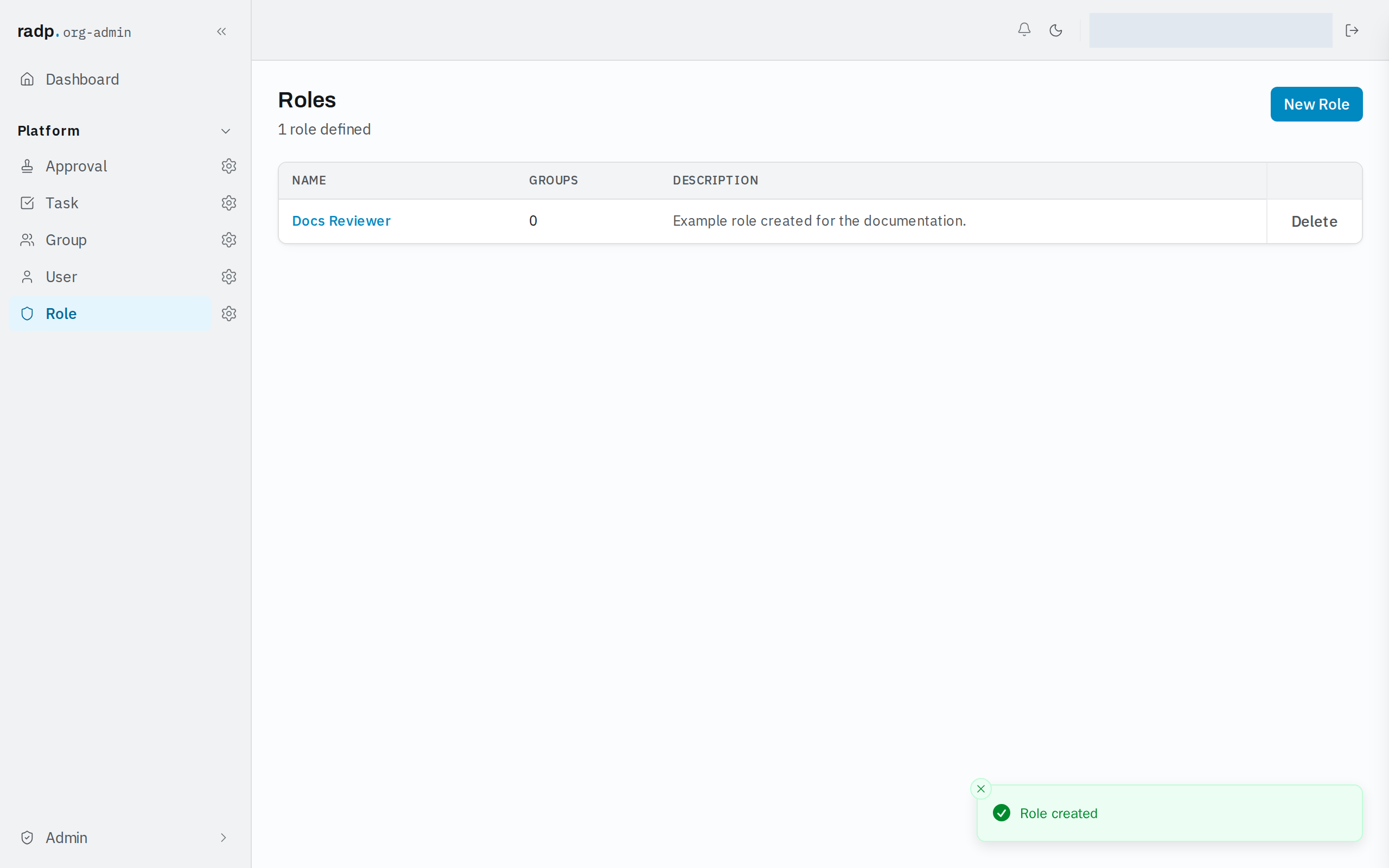 The Roles list with a newly created role in it and a confirmation message